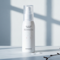 HYGGEE All-In-One Essence 110 ml, on a winter windowsill